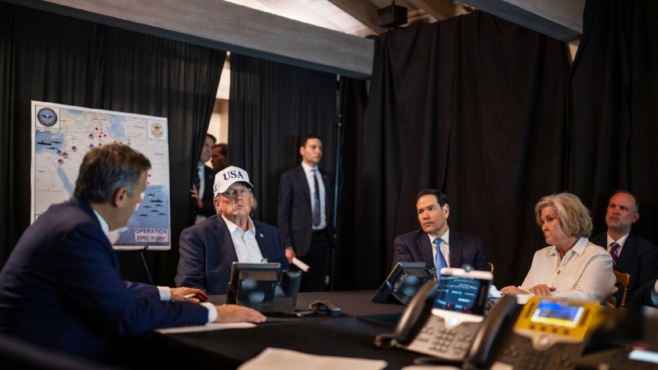 This official White House photograph shows US President Donald Trump (2L), US Secretary of State Marco Rubio (3R) and White House Chief of Staff Susie Wiles (2R) monitoring activity related to Operation Epic Fury against Iran from an unnamed location