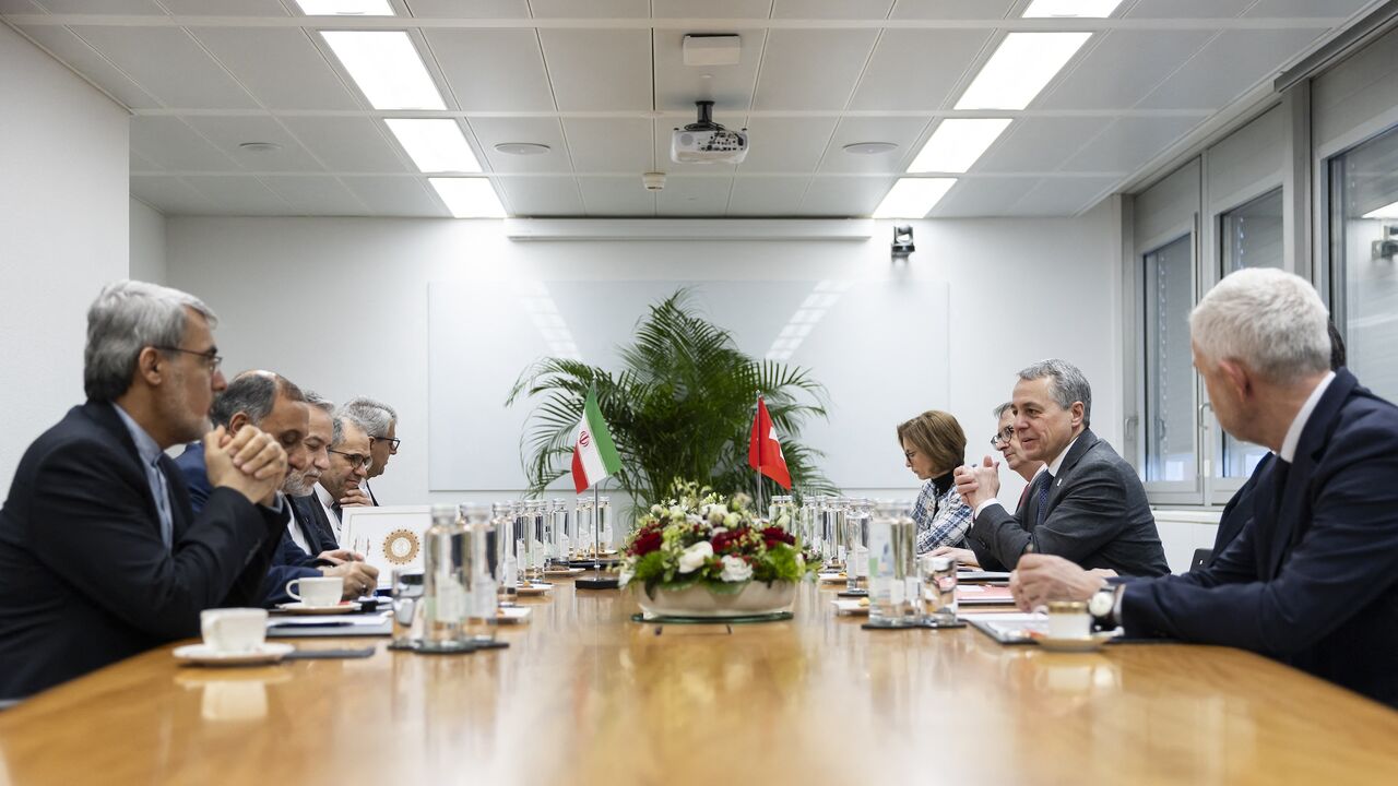 Iran's Foreign Minister Abbas Araghchi (3rd L) and Switzerland's Foreign Minister Ignazio Cassis (2nd R) attend a bilateral meeting between Switzerland and Iran during a second round of US-Iranian talks with Washington pushing Tehran to make a deal to limit its nuclear program, in Geneva on Feb. 17, 2026. 