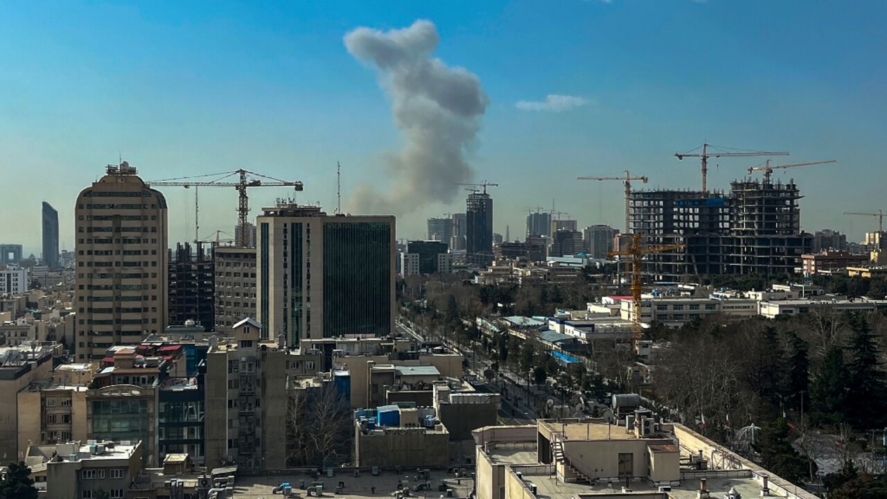 Smoke rose above Tehran after explosions were heard
