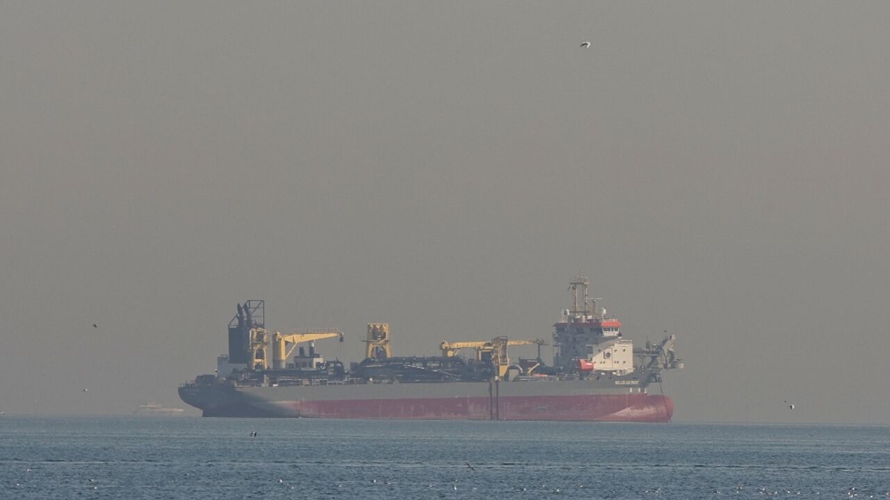 Qatar's state-run energy firm said it had halted liquefied natural gas production following Iranian attacks on facilities at two of its main gas processing bases