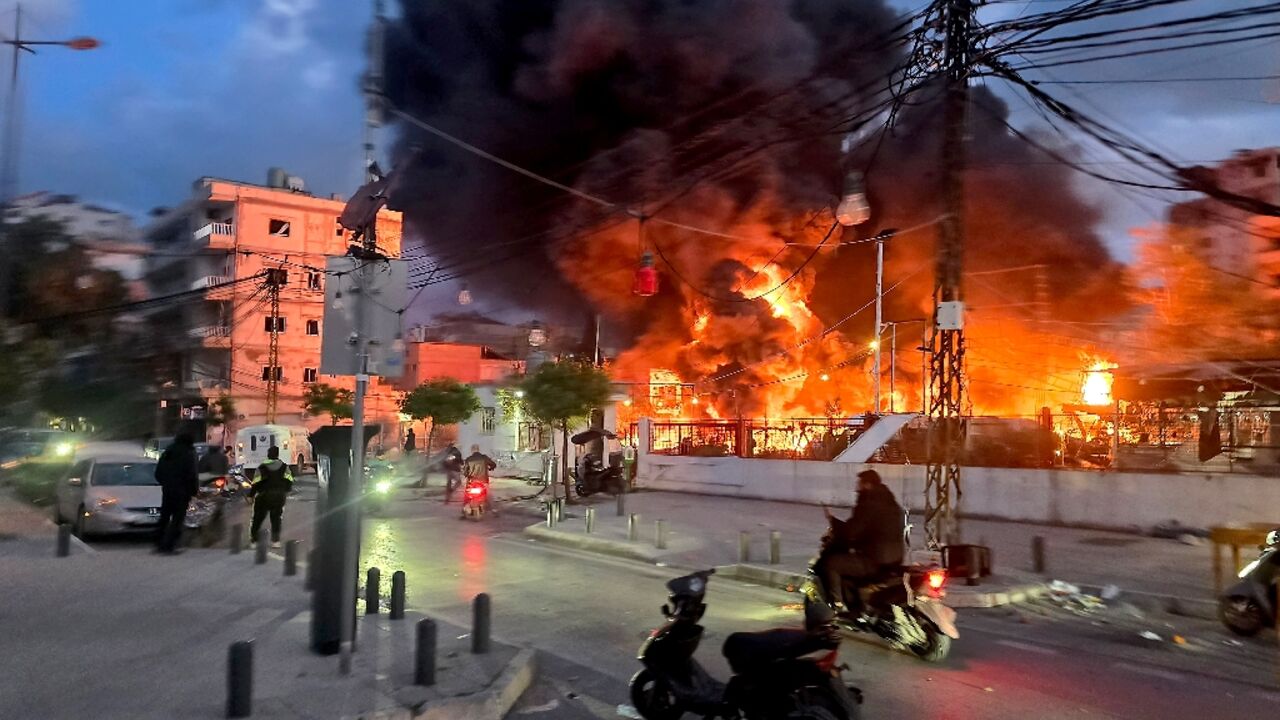 A blaze sweeps following Israeli bombardment on a solar farm and electricity generation facility in Lebanon's southern coastal city of Tyre 