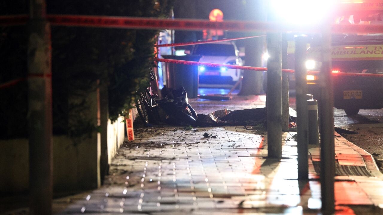 There was a heavy presence of emergency responders at the scene of a missile impact in Tel Aviv and a main road was partially cordoned off