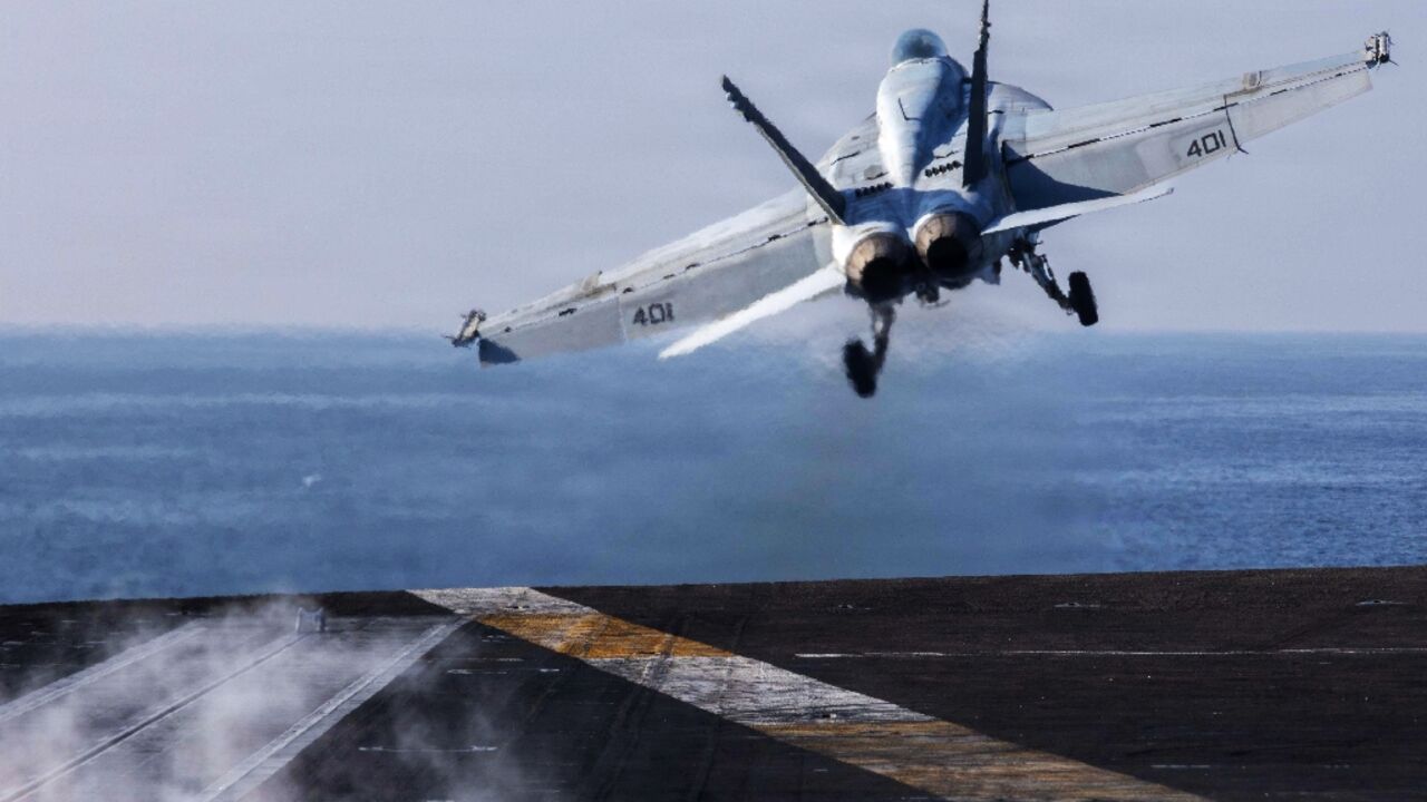 US fighter jets, including this F/A-18E Super Hornet launching from the USS Abraham Lincoln in this photo released by US Central Command public affairs, have been flying combat operations as Washington conducts its war against Iran