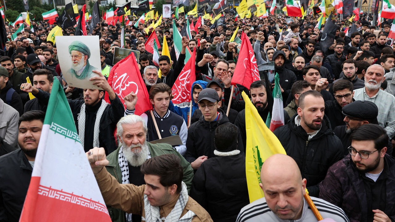 Hezbollah supporters rally in solidarity with Iran, after U.S. and Israeli strikes killed Iranian Supreme Leader Ayatollah Ali Khamenei, in Beirut, Lebanon, March 1, 2026. REUTERS/Mohamed Azakir
