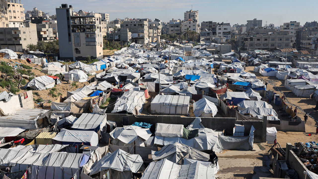 Palestinians displaced during the two-year Israeli offensive, shelter at a tent camp in Gaza City, March 1, 2026. REUTERS/Dawoud Abu Alkas