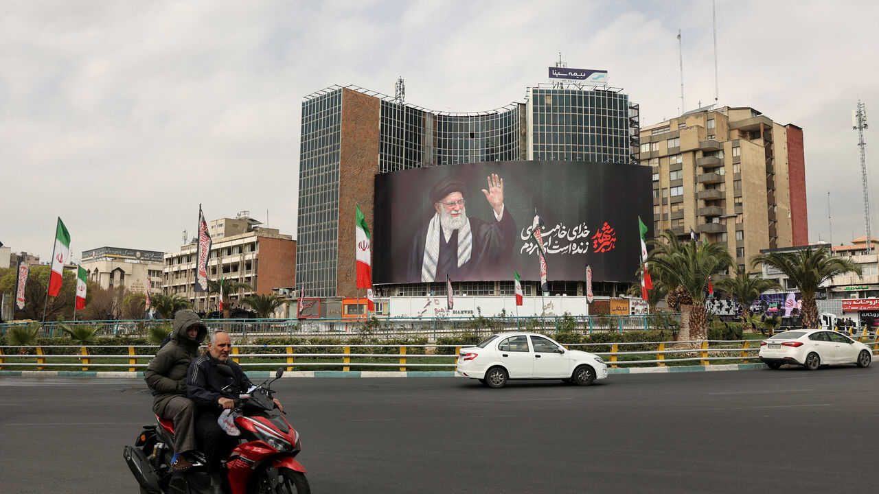 A billboard of Iran's late Supreme Leader Ayatollah Ali Khamenei on a street, after he was killed in Israeli and U.S. strikes on Saturday, in Tehran, Iran, March 2, 2026. Majid Asgaripour/WANA (West Asia News Agency) via REUTERS