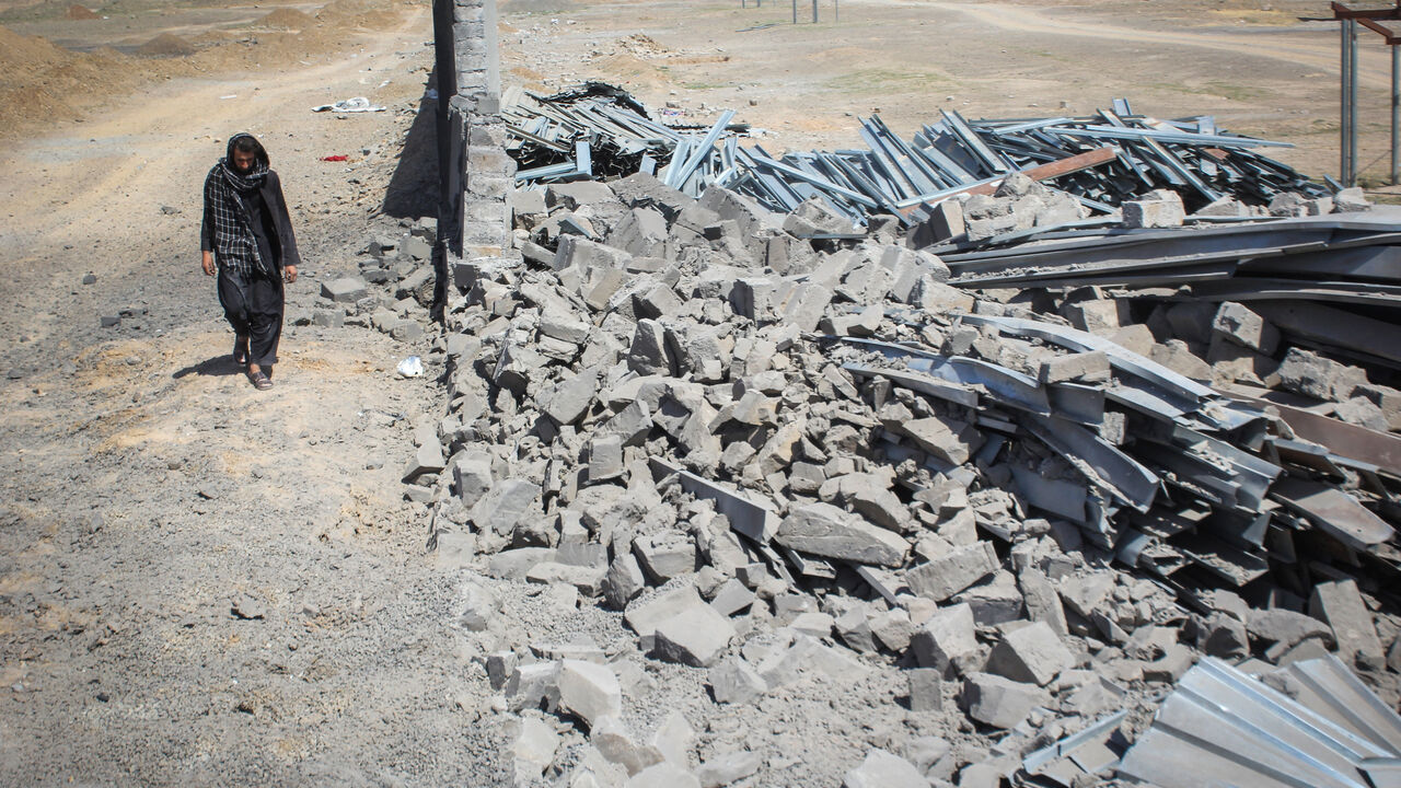 An Afghan man walks past a damaged wall following airstrikes, amid the conflict between Afghanistan and Pakistan, in Kandahar, Afghanistan, February 28, 2026. REUTERS/Stringer