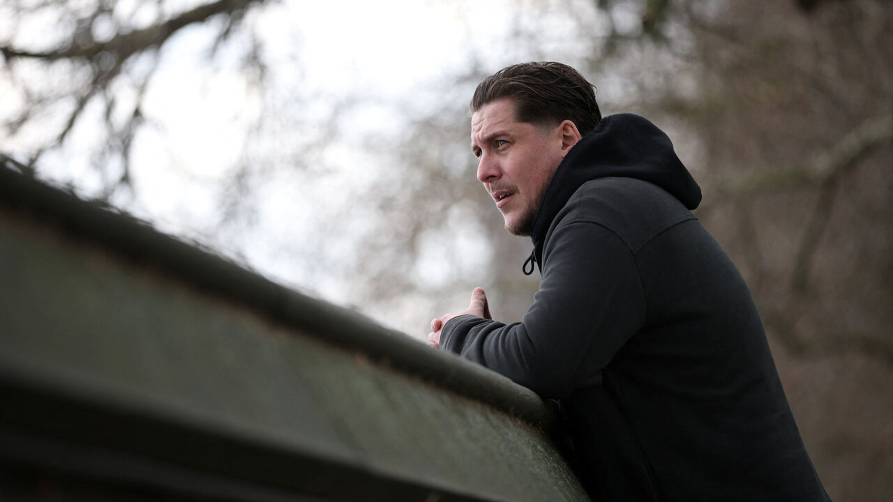 Joe Bennett, son of British citizen Lindsay Foreman, who has been imprisoned in Iran and sentenced for 10 years with her husband Craig, following their arrest on espionage charges during a round-the-world motorcycle trip in January 2025, poses for a photograph during an interview with Reuters in London, Britain March 3, 2026. REUTERS/Isabel Infantes