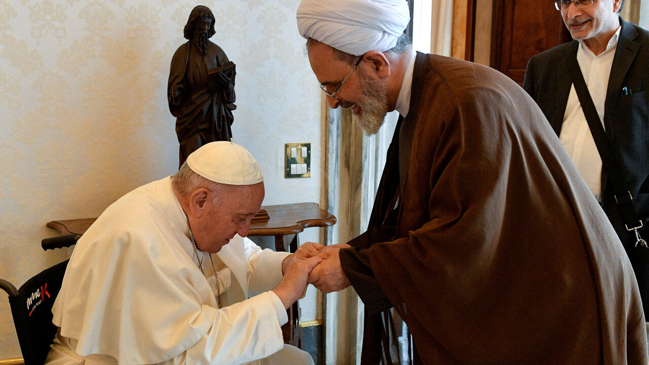 FILE PHOTO: Pope Francis receives Ayatollah Alireza Arafi, president of Islamic Seminaries of Iran, and entourage in a private audience at the Vatican May 30, 2022. Vatican Media/Handout via REUTERS THIS IMAGE HAS BEEN PROVIDED BY A THIRD PARTY/File Photo
