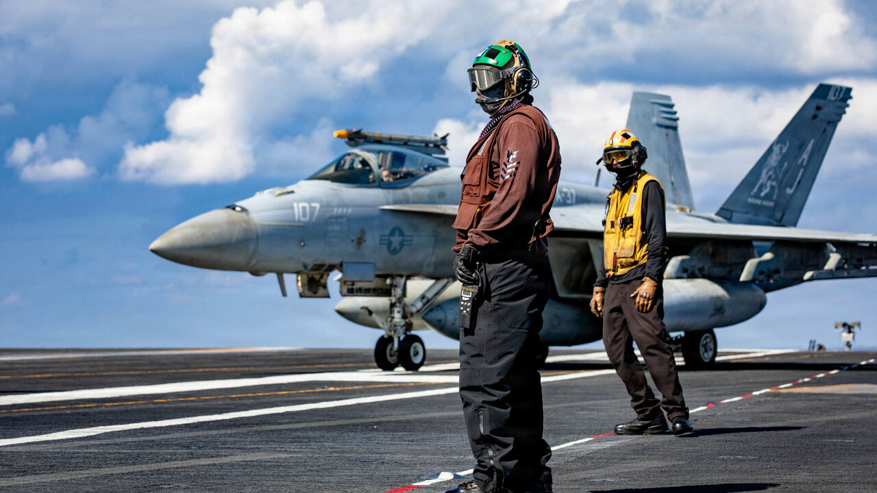U.S. Navy sailors observe flight deck operations on the aircraft carrier USS Gerald R. Ford while operating in support of the Operation Epic Fury attack on Iran in the eastern Mediterranean Sea, March 2, 2026. U.S. Navy/Handout via REUTERS