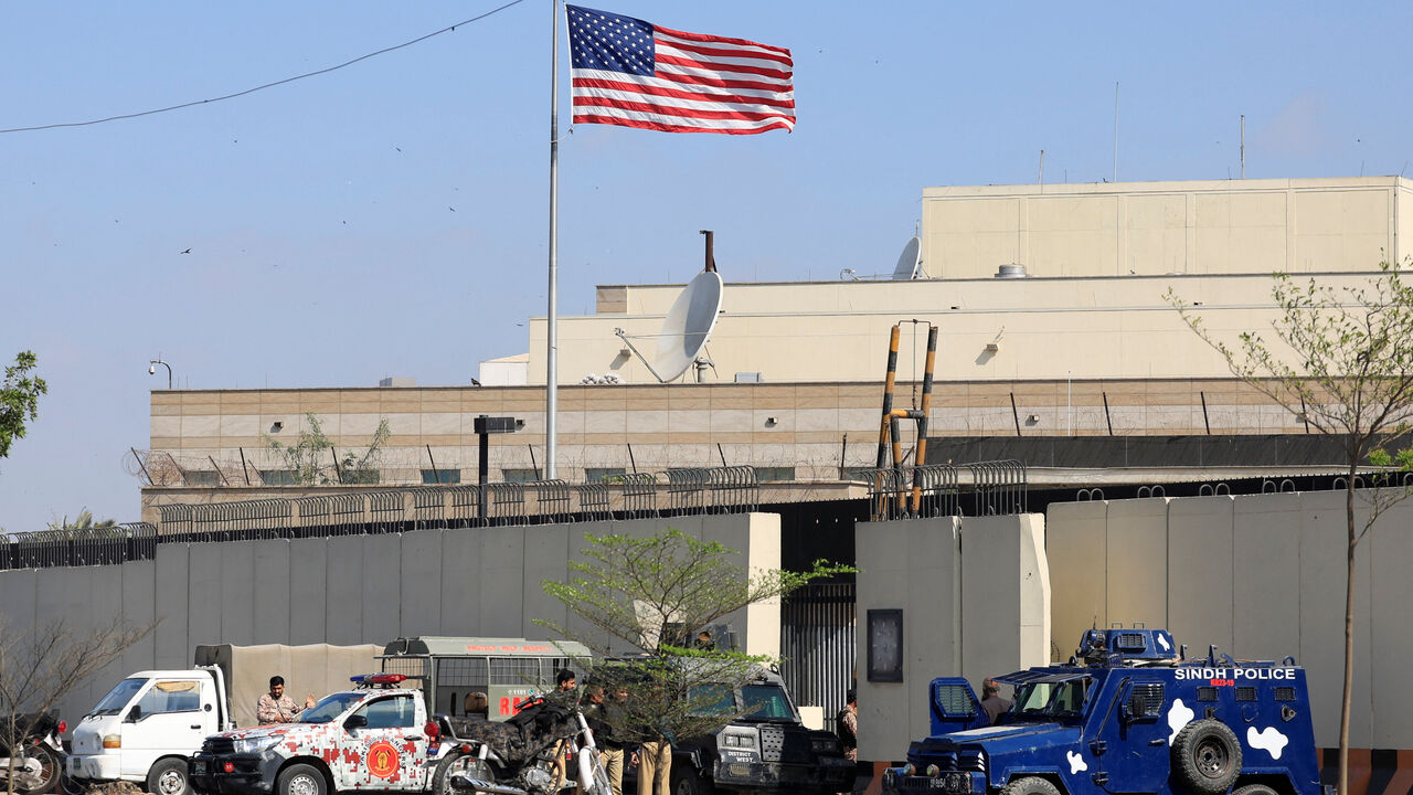 Police and paramilitary soldiers stand guard outside the U.S. Consulate General, days after a protest following the killing of Iran's Supreme Leader Ayatollah Ali Khamenei in U.S. and Israeli strikes on Saturday, in Karachi, Pakistan, March 5, 2026. Picture taken with a mobile phone. REUTERS/Akhtar Soomro