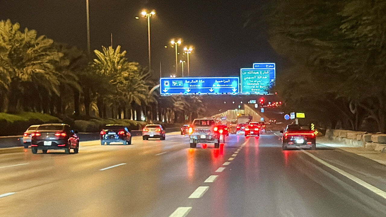 Vehicles drive along a street near the Diplomatic Quarter, following drone strikes that hit the U.S. embassy compound and were intercepted by Saudi air defences, according to the Defence Ministry, in Riyadh, Saudi Arabia, March 3, 2026. Picture taken with a mobile phone. REUTERS/Stringer