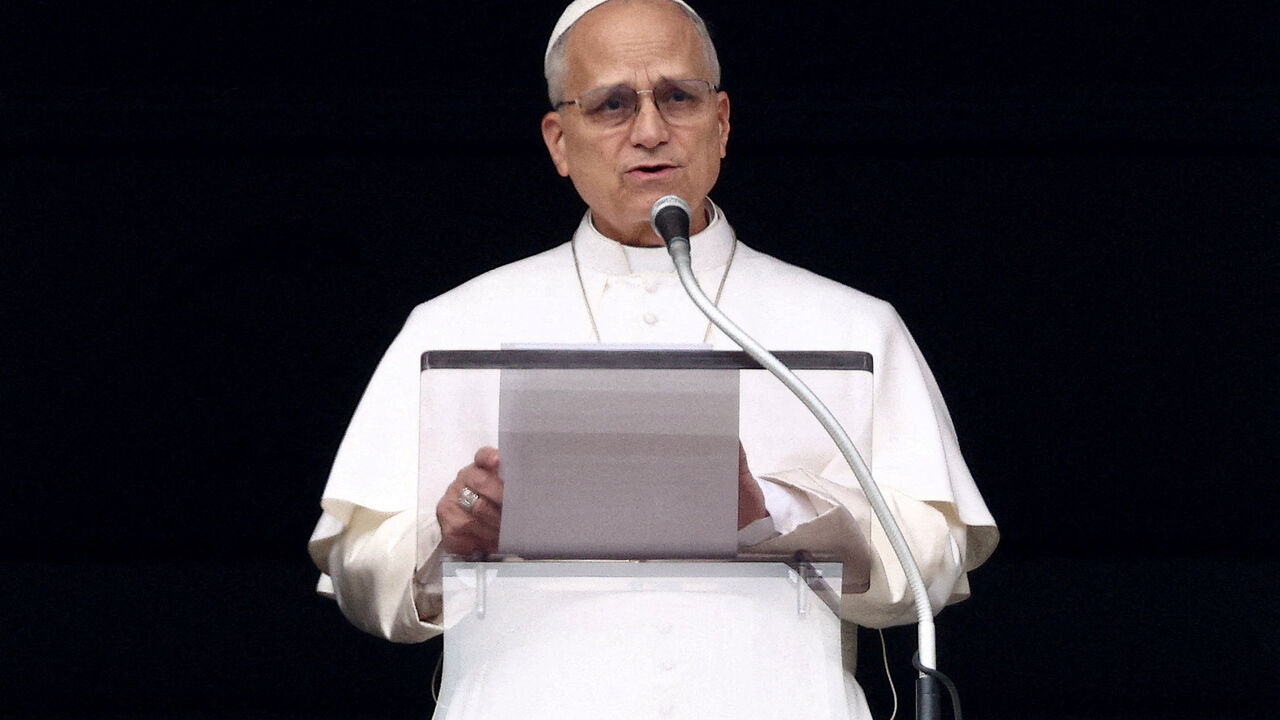 FILE PHOTO: Pope Leo XIV leads the Angelus prayer from the window of the Apostolic Palace at the Vatican, March 1, 2026. REUTERS/Guglielmo Mangiapane/File Photo