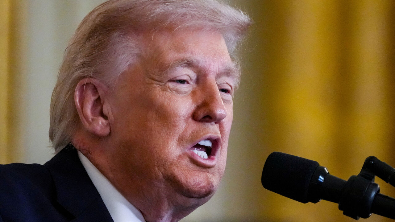 FILE PHOTO: U.S. President Donald Trump speaks, as a patch of blemished skin is visible above his shirt collar, during  a Medal of Honor ceremony at the White House in Washington, D.C., U.S., March 2, 2026. REUTERS/Ken Cedeno/File Photo
