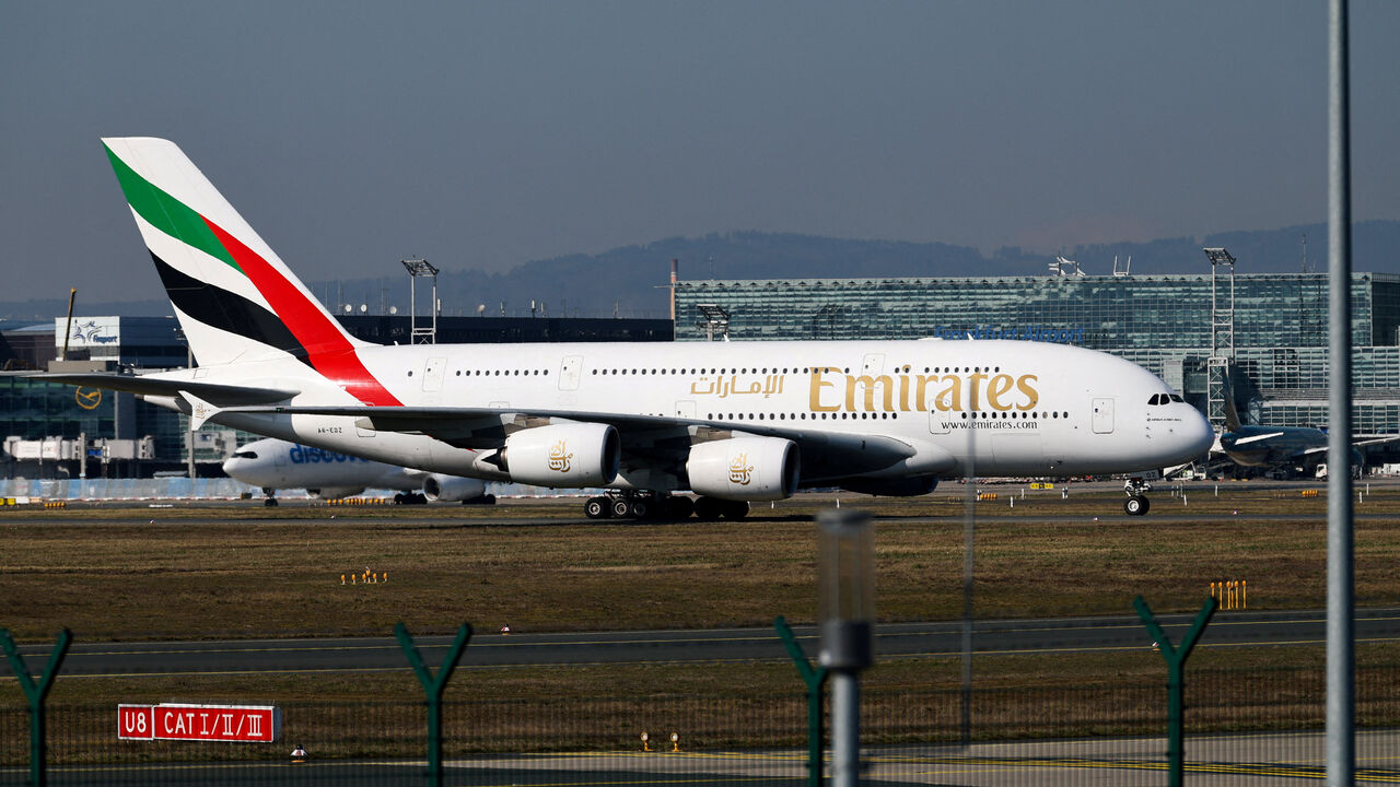 FILE PHOTO: An Emirates plane with German tourists evacuated from the Middle East arrives from Dubai, amid the U.S.-Israeli conflict with Iran, at the airport in Frankfurt, Germany, March 3, 2026. REUTERS/Kai Pfaffenbach/File Photo