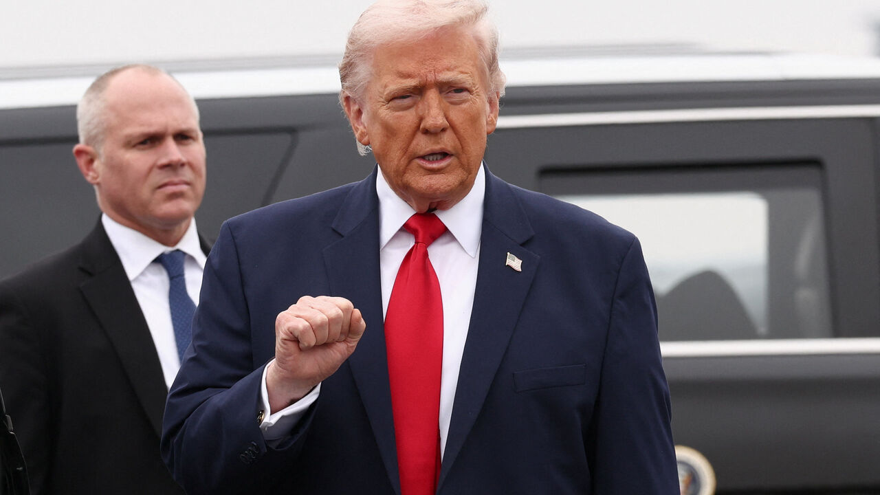 U.S. President Donald Trump gestures as he arrives for a dignified transfer ceremony, in Dover, Delaware, U.S., March 7, 2026. REUTERS/Kevin Lamarque