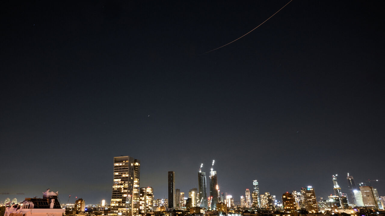 An Iranian missile flies towards Israel, amid the U.S.-Israeli conflict with Iran, as seen from Tel Aviv, Israel March 9, 2026. REUTERS/Dylan Martinez