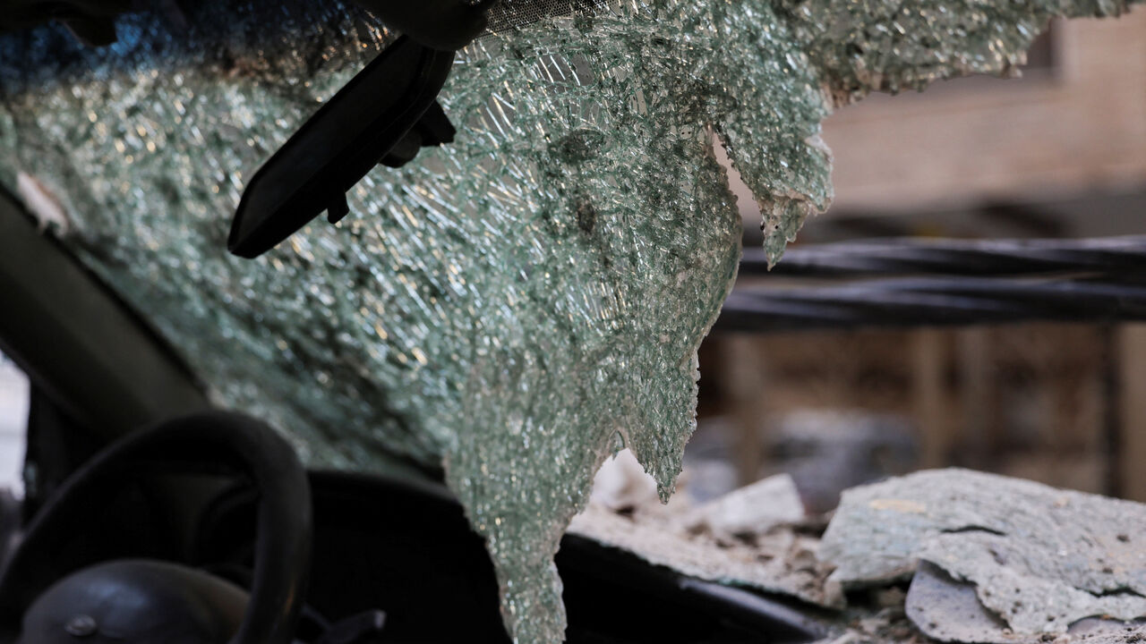 A damaged windshield of a vehicle at the site of an Israeli strike on a apartment building, in central Beirut, Lebanon, March 11, 2026, following an escalation between Hezbollah and Israel amid the U.S.-Israeli conflict with Iran. REUTERS/Emilie Madi