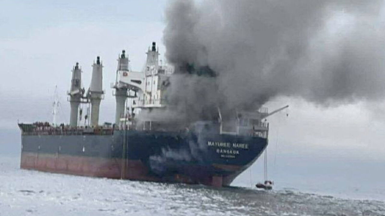 The Thailand-flagged cargo ship Mayuree Naree engulfed in black smoke in the Strait of Hormuz, March 11, 2026.  ROYAL THAI NAVY/Handout via REUTERS