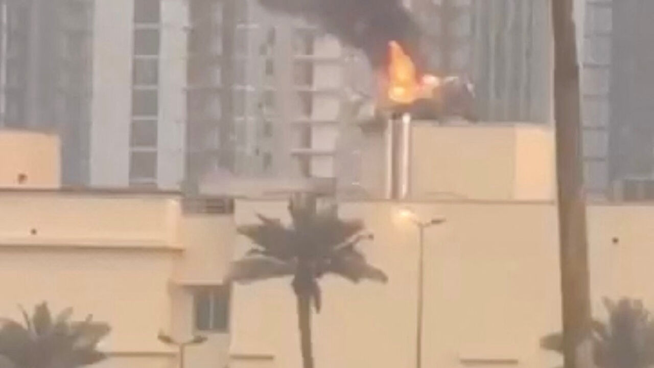 Smoke rises from the U.S. embassy building, after Iraqi security sources said the embassy was hit in a missile attack, in Baghdad, Iraq March 14, 2026 in this screen grab obtained from a social media video. SOCIAL MEDIA/via REUTERS