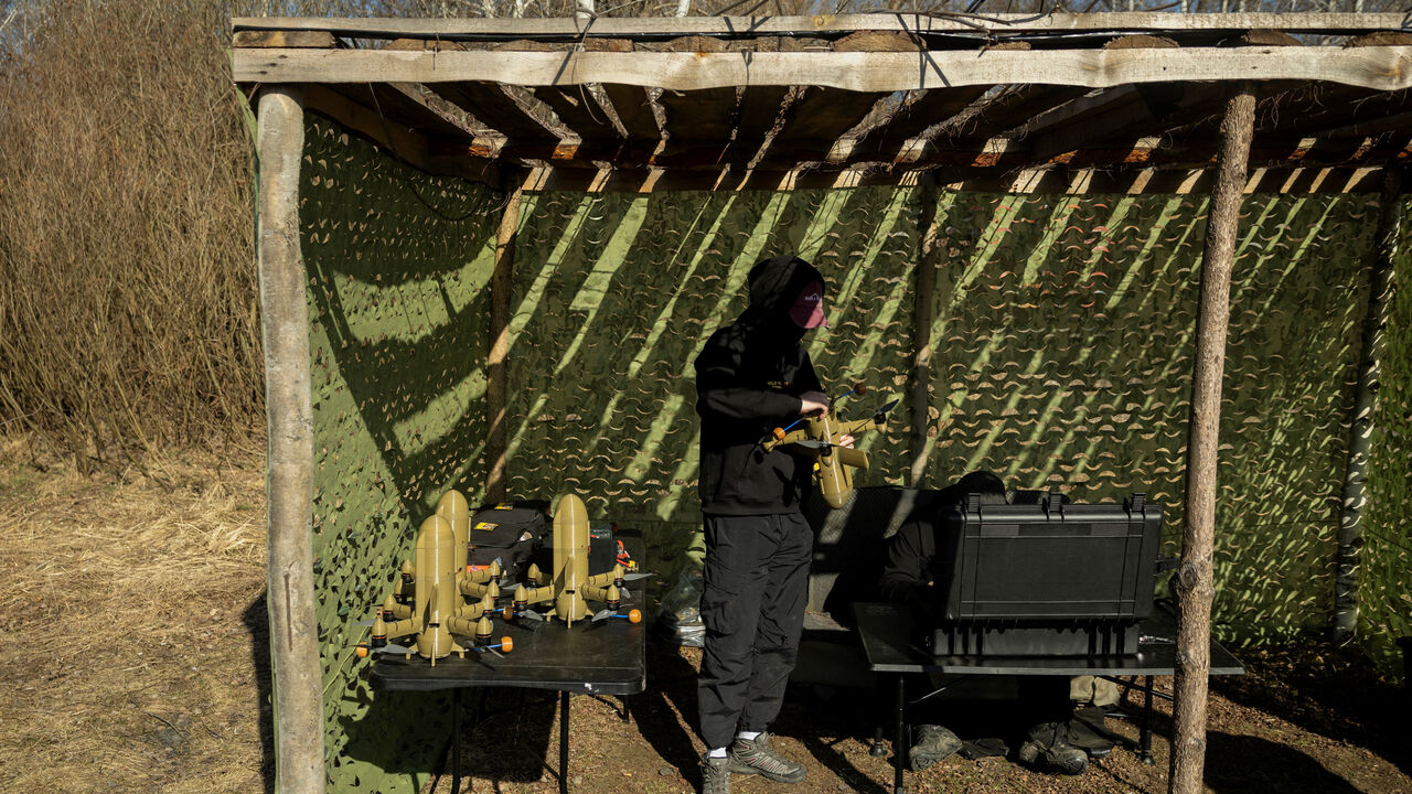 An engineer of the private drone interceptor company Wild Hornets prepares a Sting interceptor for a flight at an undisclosed location in Ukraine, March 16, 2026. REUTERS/Thomas Peter