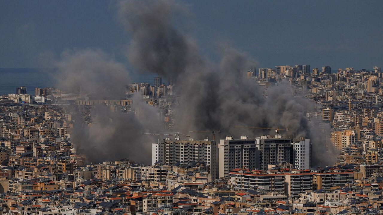 Smoke billows after reported strikes on Beirut's southern suburbs, following an escalation between Hezbollah and Israel amid the U.S.-Israeli conflict with Iran, as seen from Baabda, Lebanon, March 6, 2026. REUTERS/Mohamed Azakir/File Photo