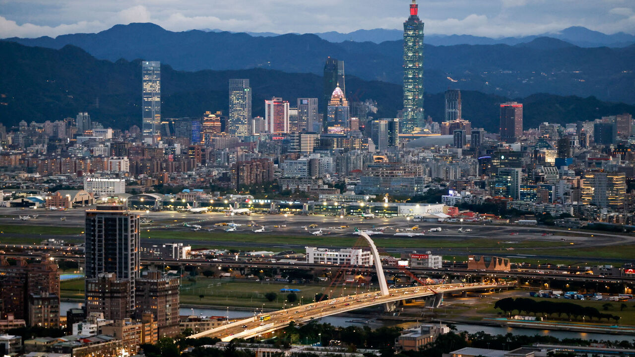 A general view shows Taipei city skyline, including the Taipei 101 skyscraper, with Songshan Airport in the foreground in Taipei, Taiwan February 23, 2026. REUTERS/Ann Wang