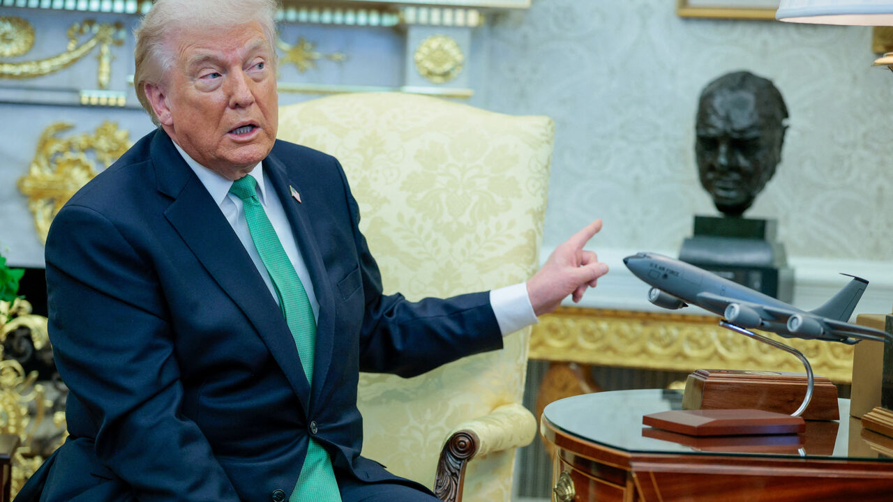 U.S. President Donald Trump gestures during a meeting with Irish Taoiseach (Prime Minister) Micheal Martin at the White House in Washington, D.C., U.S., March 17, 2026. REUTERS/Evan Vucci