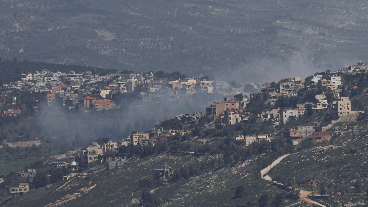 Smoke rises from a Lebanese village near the border with Israel, amid escalation between Iran-backed Hezbollah and Israel, and amid the U.S.-Israeli conflict with Iran, as seen from northern Israel, March 19, 2026. REUTERS/Tyrone Siu