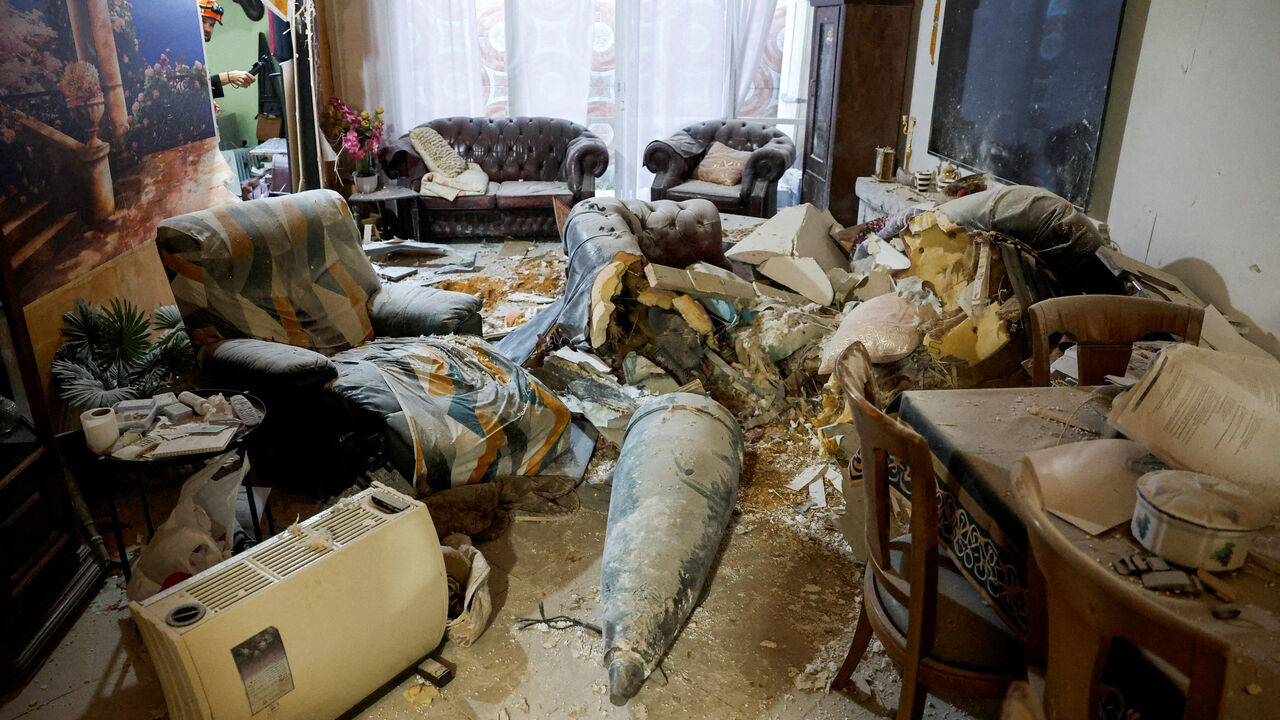 FILE PHOTO: Part of an Iranian missile in a living room, after Iran launched barrages of missiles towards Israel, amid the U.S.-Israel conflict with Iran, in Rehovot, Israel, March 20, 2026. REUTERS/Tomer Appelbaum/File Photo