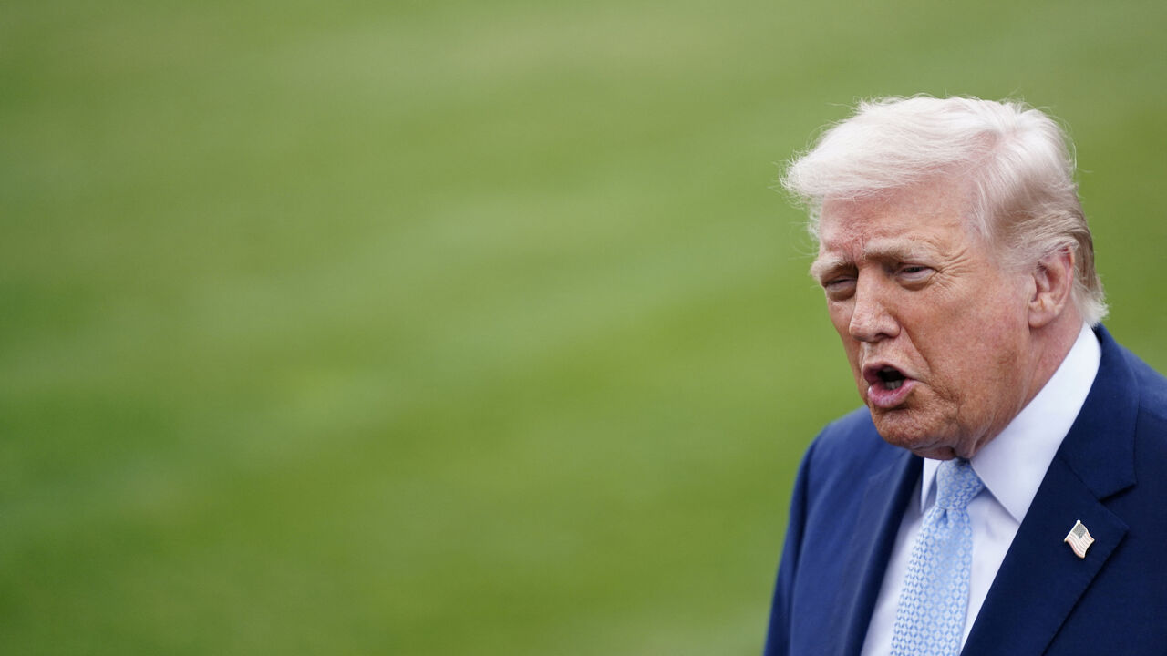 U.S. President Donald Trump speaks to the media as he departs the White House for Florida, in Washington, D.C., U.S., March 20, 2026. REUTERS/Nathan Howard