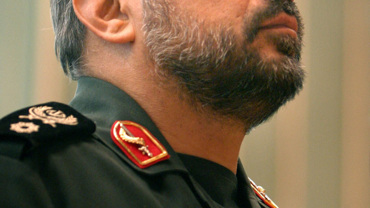 FILE PHOTO: Iran's Deputy Revolutionary Guards Commander Mohammad Baqer Zolqadr stands at attention during the playing of the national anthem at an anti-U.S. conference called "The world without America" in Tehran, Iran November 8, 2004. REUTERS/Raheb Homavandi/File Photo