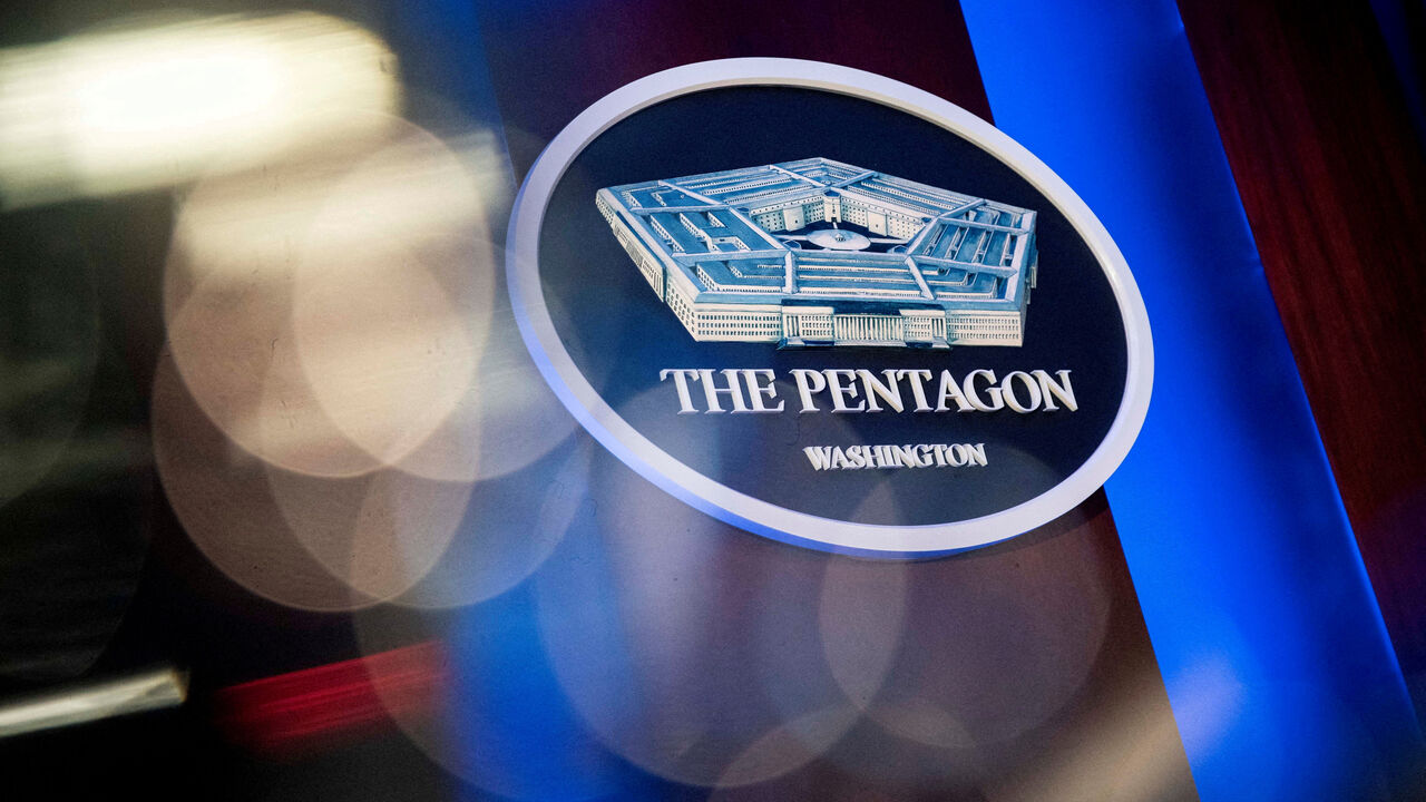 FILE PHOTO: The Pentagon logo is seen behind the podium in the briefing room at the Pentagon in Arlington, Virginia, U.S., January 8, 2020. REUTERS/Al Drago/File Photo