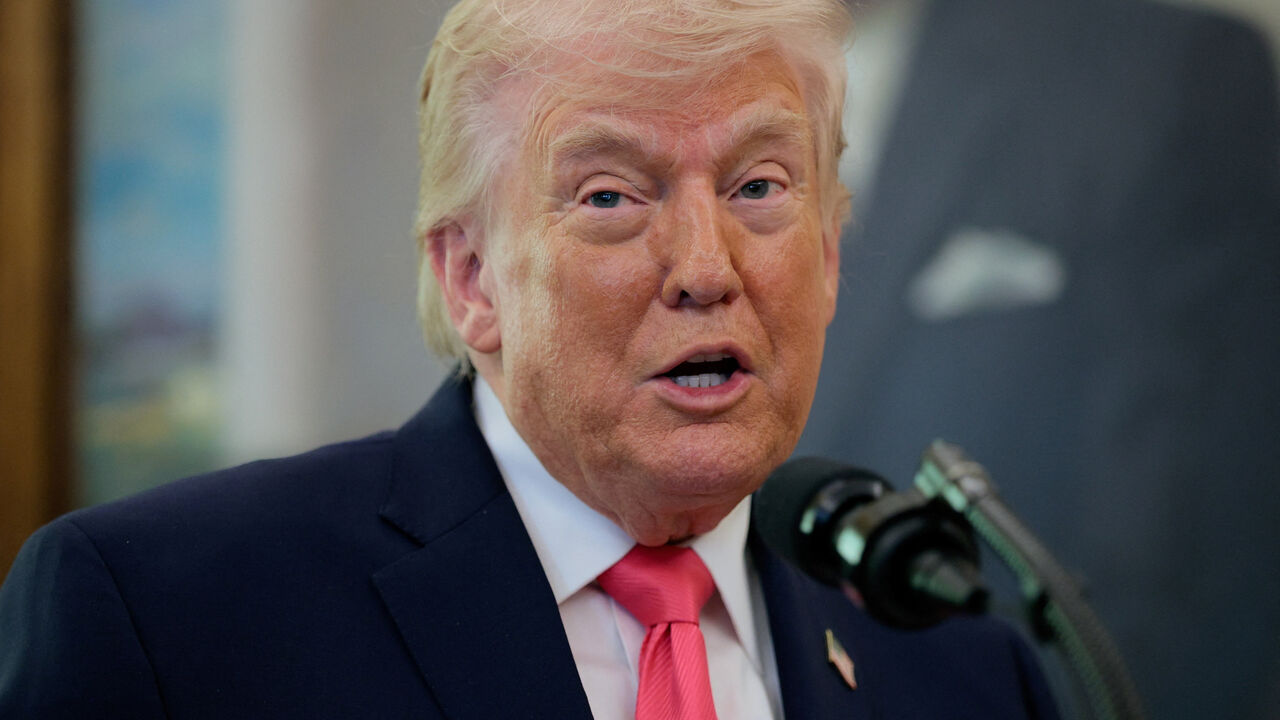 U.S. President Donald Trump speaks as he attends Markwayne Mullin's swearing-in as Department of Homeland Security (DHS) Secretary, at the White House in Washington, D.C., U.S., March 24, 2026. REUTERS/Evan Vucci