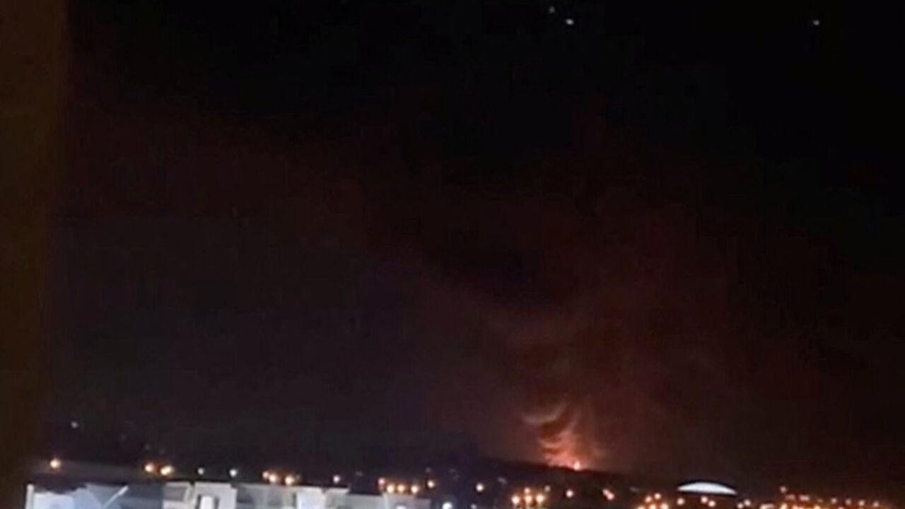 Smoke and fire rise in the direction of the fuel tank at Kuwait International Airport, following a drone strike amid the U.S.-Israeli conflict with Iran, in Al-Dajeej, Kuwait, March 25, 2026, in this still image obtained from a social media video. Social Media/via REUTERS