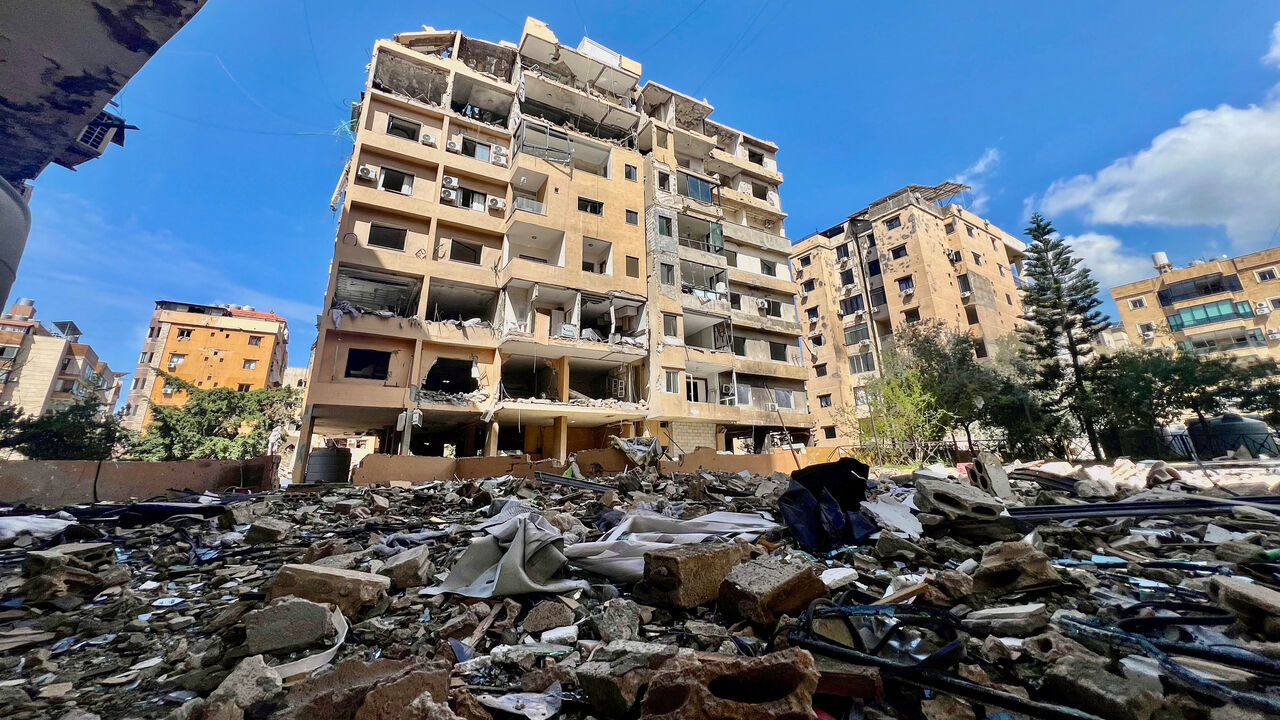 Debris and damaged buildings in the aftermath of overnight Israeli strikes, amid an escalation between Hezbollah and Israel, amid the U.S.-Israeli conflict with Iran, in Beirut's southern suburbs, Lebanon, March 24, 2026. Picture taken with a mobile phone. REUTERS/Stringer