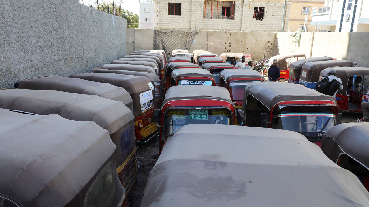 Rickshaw tuktuk taxis are parked in a yard following high fuel prices, amid the U.S.-Israeli conflict with Iran, in Mogadishu, Somalia, March 25, 2026 REUTERS/Feisal Omar