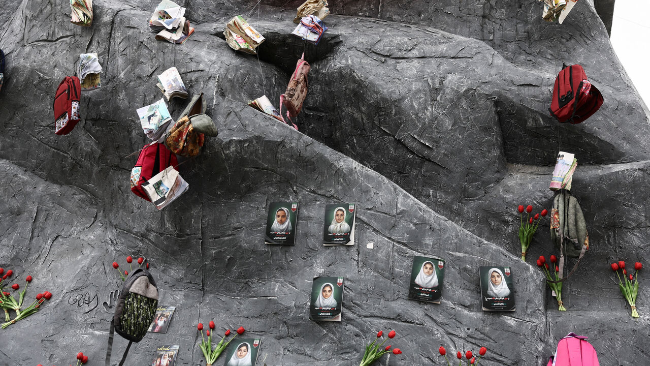 Pictures of child victims killed in strikes, are displayed in a square, amid the U.S.-Israeli conflict with Iran, in Tehran, Iran, March 28, 2026. Majid Asgaripour/WANA (West Asia News Agency) via REUTERS