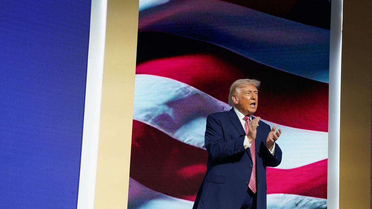 U.S. President Donald Trump applauds onstage before delivering remarks at the Future Investment Initiative (FII) Institute's summit at the Faena Forum in Miami Beach, Florida, U.S., March 27, 2026. REUTERS/Elizabeth Frantz