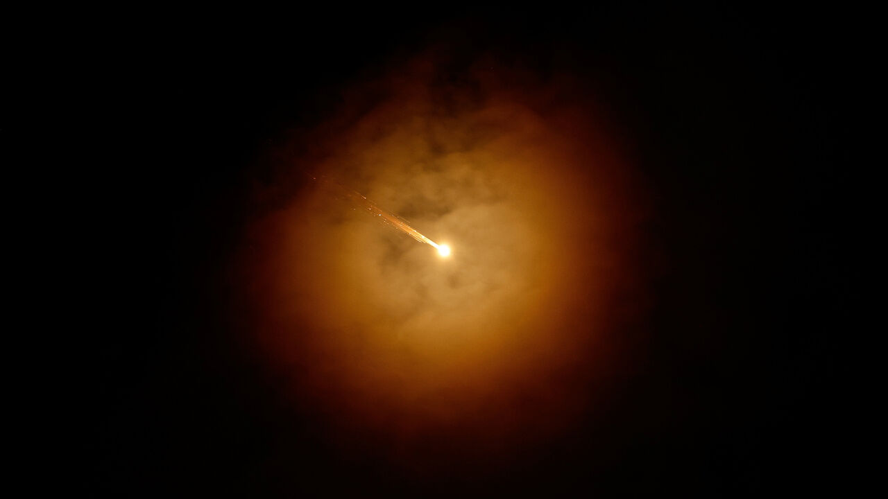 An Iranian missile flies towards Israel, amid the U.S.-Israeli conflict with Iran, as seen from Hebron, in the Israeli-occupied West Bank, March 28, 2026. REUTERS/Mussa Qawasma
