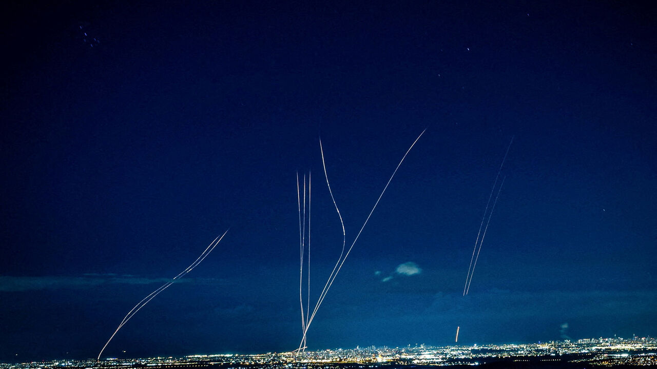 Interceptors rise into the sky after Iran launched missiles into Israel, as seen from central Israel, February 28.   REUTERS/Oren Ben Hakoon