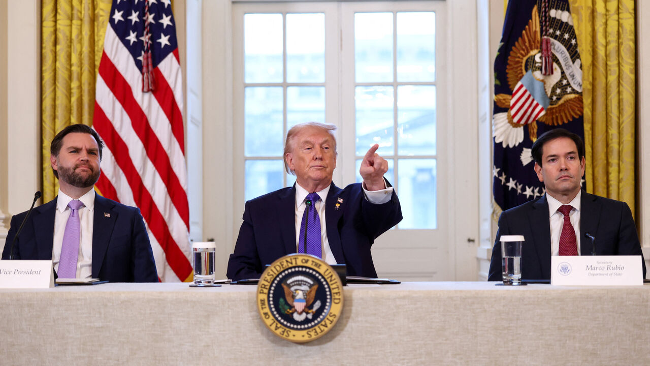 U.S. President Donald Trump takes questions from reporters while Vice President JD Vance and Secretary of State Marco Rubio look on, as they attend a meeting with oil industry executives, at the White House in Washington, D.C., U.S., January 9, 2026. REUTERS/Kevin Lamarque