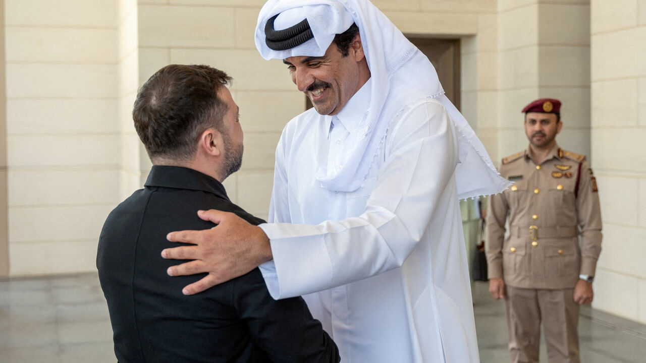 FILE PHOTO: The Emir of Qatar, Sheikh Tamim bin Hamad Al Thani, meets President of Ukraine, Volodymyr Zelenskiy, in Doha, Qatar, March 28, 2026. Amiri Diwan/Handout via REUTERS/File Photo