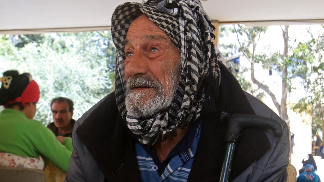 A man from southern Lebanon takes shelter at a school in Sidon
