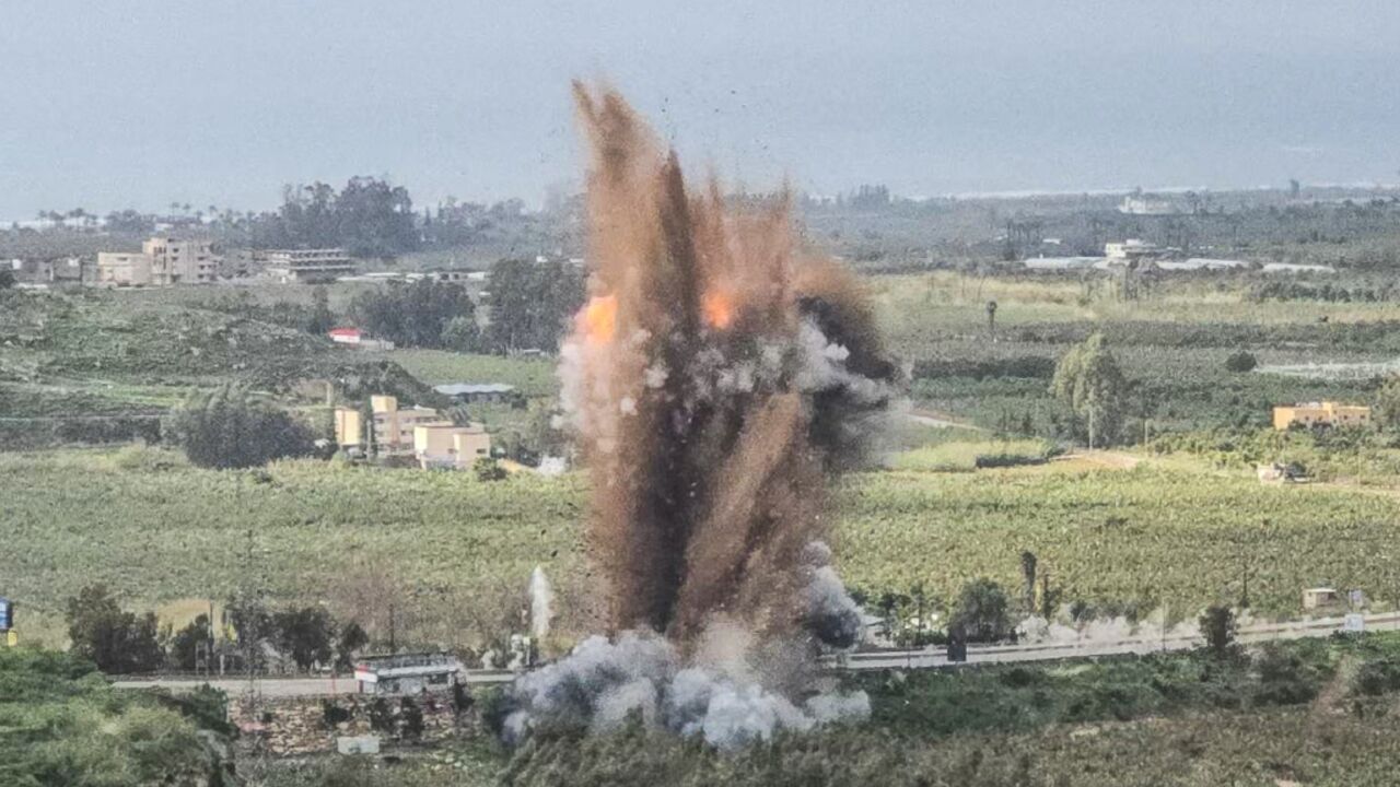 Smoke rises from an Israeli airstrike on the Qasmiyeh bridge in south Lebanon on March 22, after Israel said the bridge was being used by Hezbollah