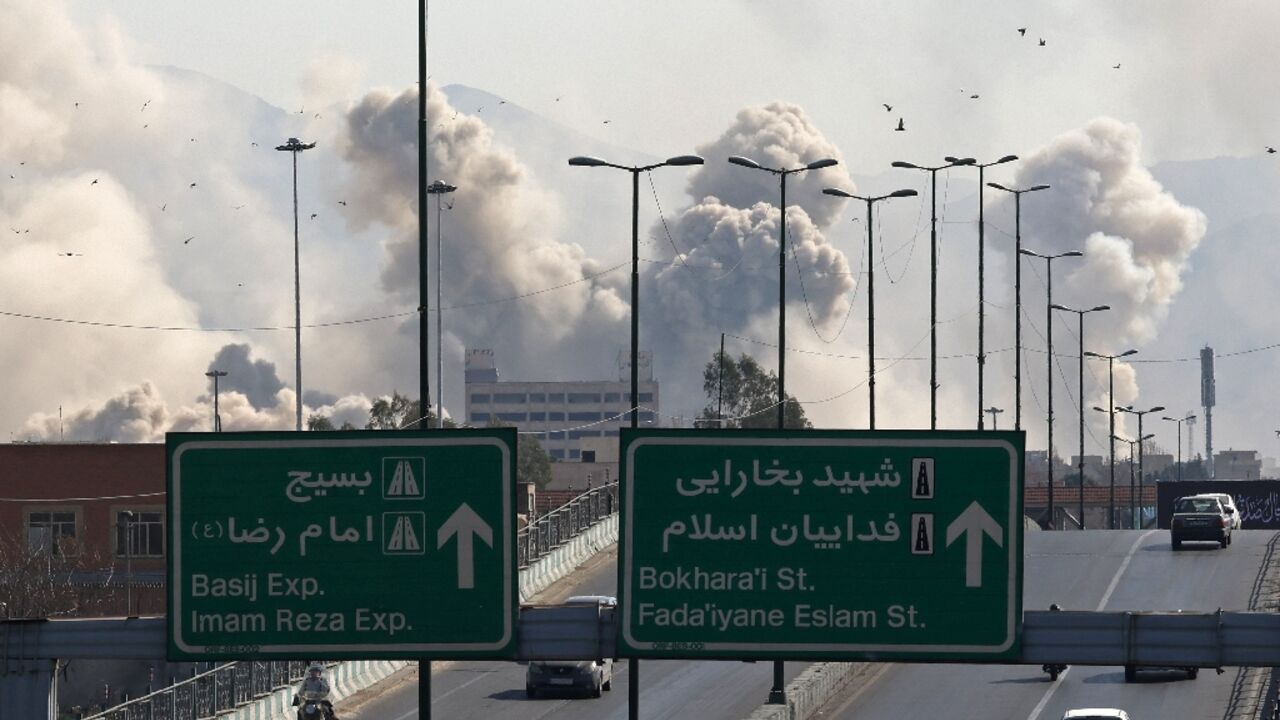 Smoke rises over Tehran on March 5