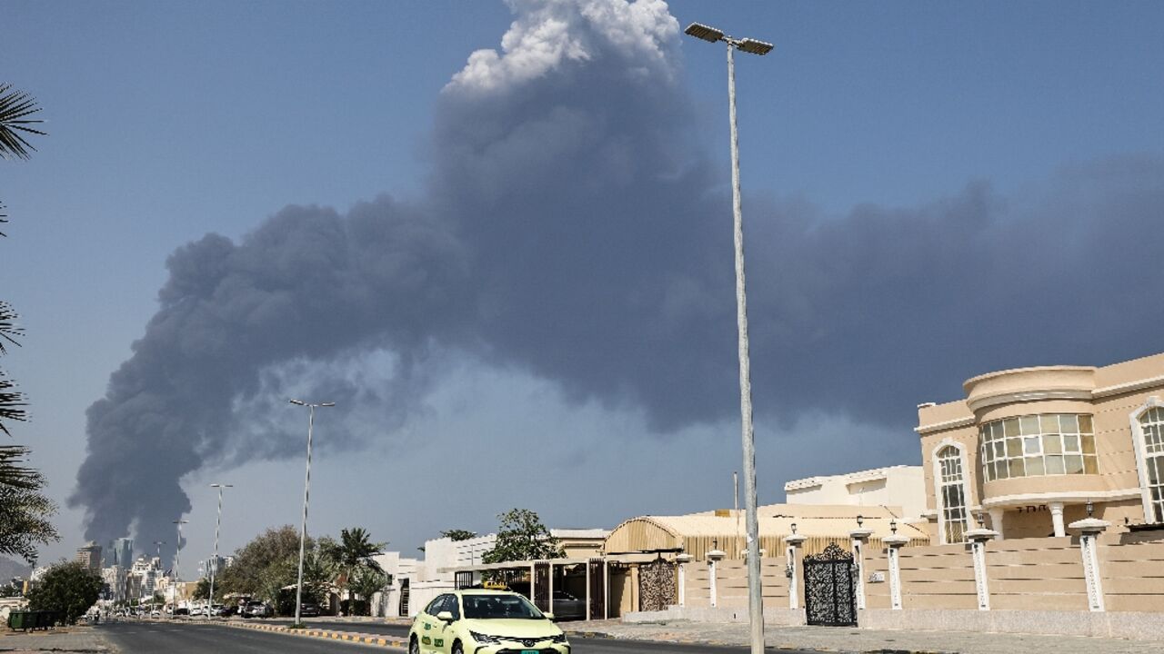 Smoke rises from the direction of an energy installation in the Gulf emirate of Fujairah