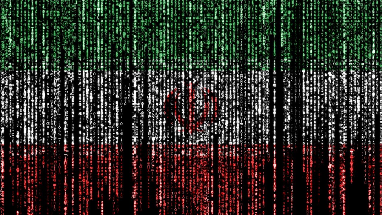 Flag of Iran on a computer binary codes falling from the top and fading away.