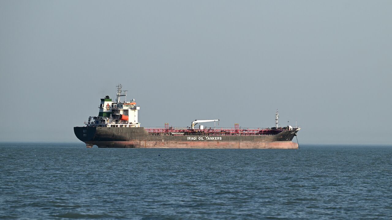 An Iraqi oil tanker waits at the Khawr Abd Allah canal leading up to Al-Faw port in southern Iraq, on June 6, 2024.