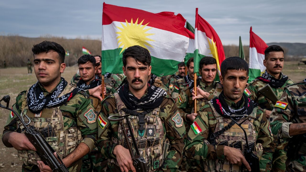 Kurdish Peshmerga fighters affiliated with PAK train on Jan. 18, 2026, near Erbil, Iraq. 